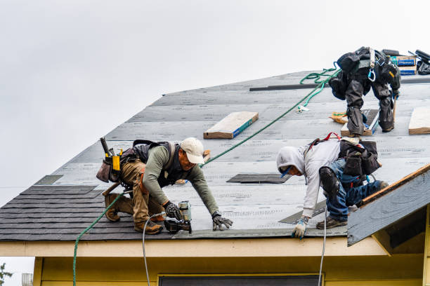 Professional Gutter Installation technician working in Harper, KS